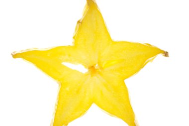 Macro shot of a carambola slice on white background clipart