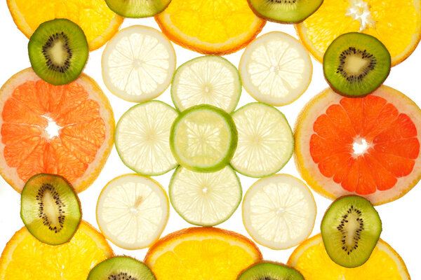 Colorful background of different fruit slices