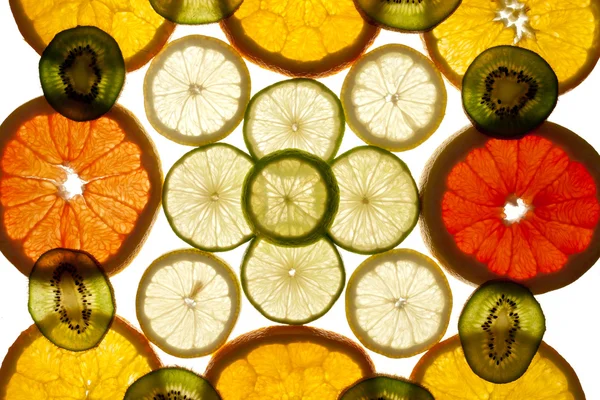 Fondo colorido de diferentes rebanadas de fruta —  Fotos de Stock