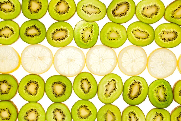 stock image Fruity background set of whole kiwi and lemon slices