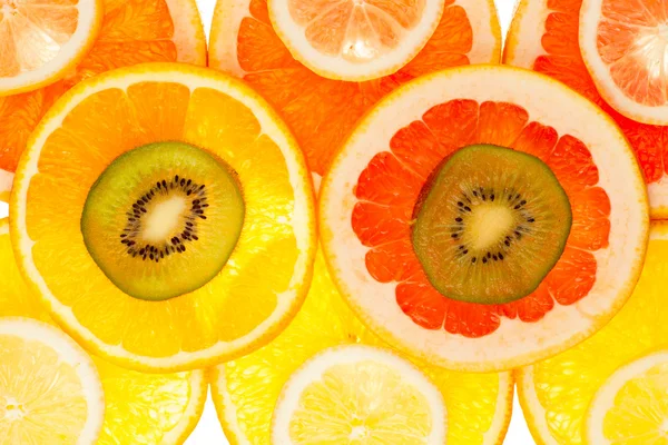 Hintergrund von Kiwi, Grapefruit, Orangen- und Zitronenscheiben — Stockfoto