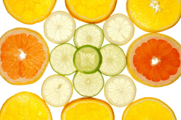Fundo colorido de diferentes fatias de frutas — Fotografia de Stock