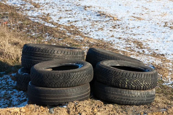 stock image Illegally disposed of tires by the wayside