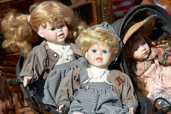 stock image Several old dolls at a flea market