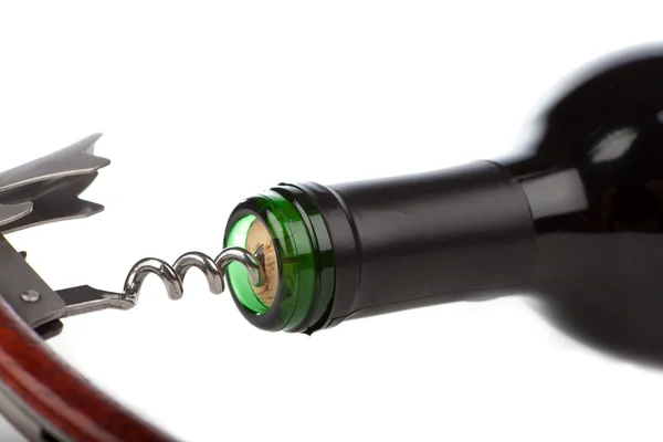 Corkscrew with wine bottle on white background — Stock Photo, Image