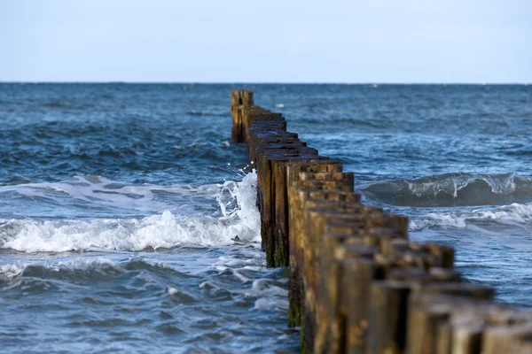 stock image Groynes in the surf on the German Baltic coast