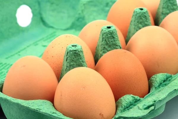 Brown chicken eggs in a carton — Stock Photo, Image
