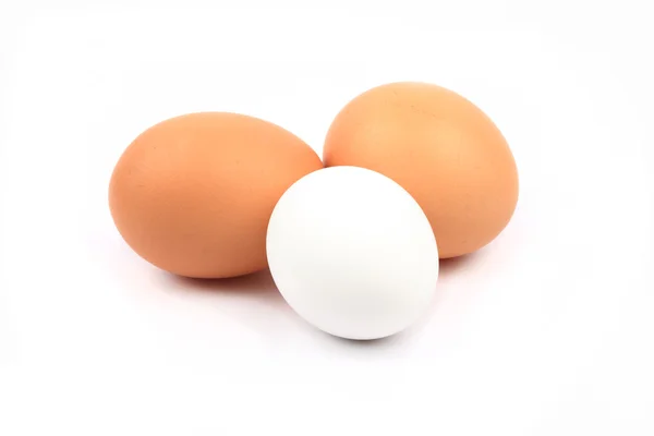 Three eggs in front of white background — Stock Photo, Image