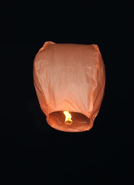Launching sky lanterns. Royalty Free Stock Images