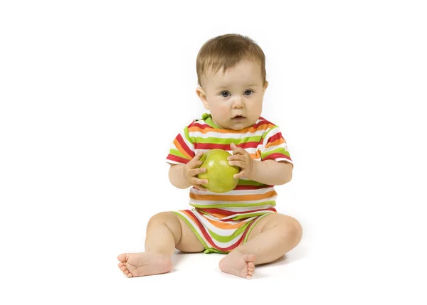 Baby med eple – stockfoto