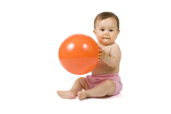 Baby med bolden Stock-billede