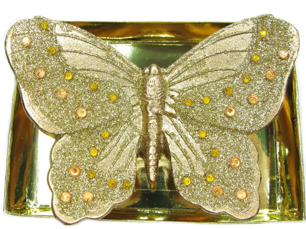 Spa brąz candle kształcie motyla — Zdjęcie stockowe