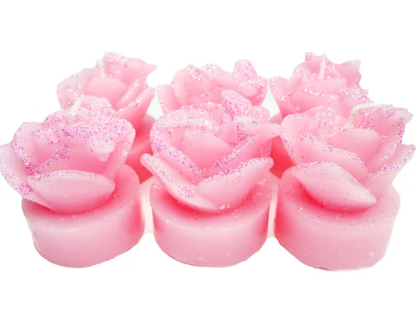 Pink candles set rose flowers shape — Stock Photo, Image