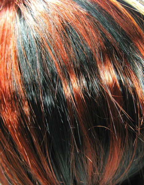 Mettre en évidence les cheveux noir et rouge texture fond — Photo
