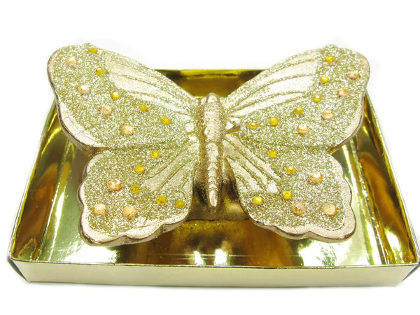 Bronzová svíce tvaru motýla — Stock fotografie