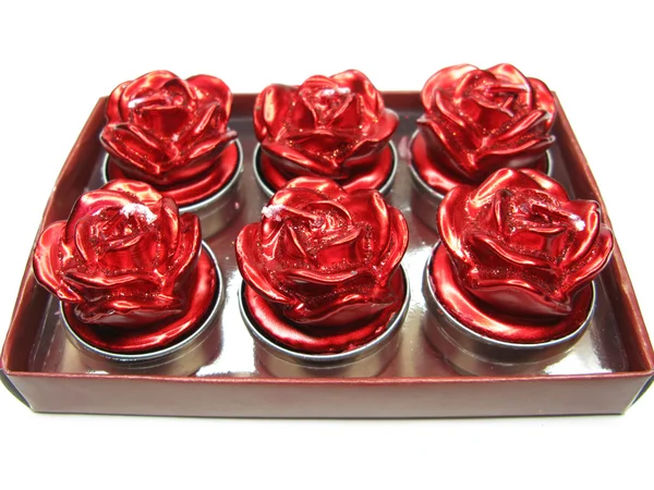 红蜡烛设置玫瑰花朵形状 — 图库照片