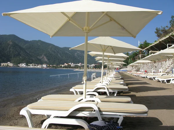 stock image Beach with sun-tents and sun-beds