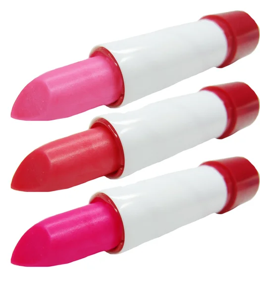 Drie rode lippenstift cosmetica — Stockfoto