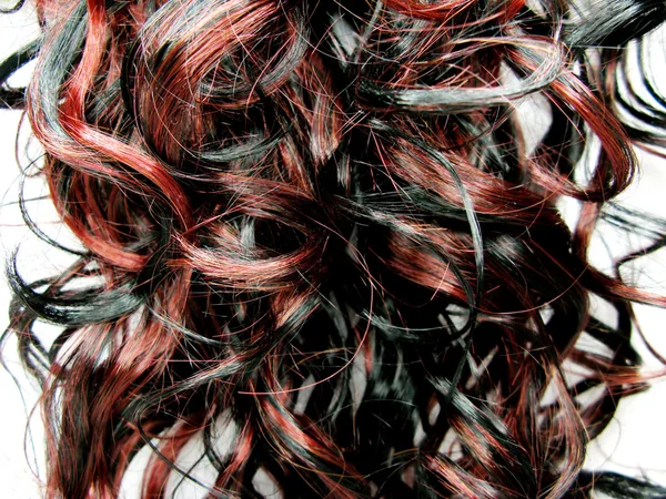 Zvýraznit kudrnaté tmavé vlasy textury pozadí — Stock fotografie