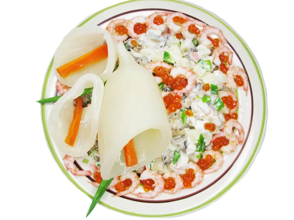 Кальмары с салатом из икры — стоковое фото