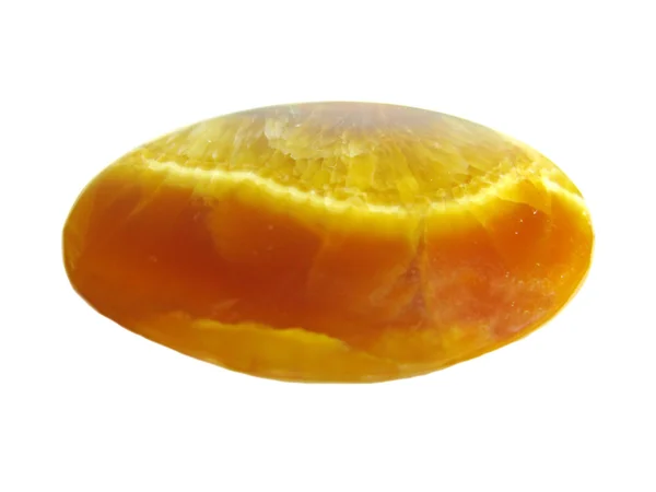 Круглый жёлтый минеральный кристалл — стоковое фото