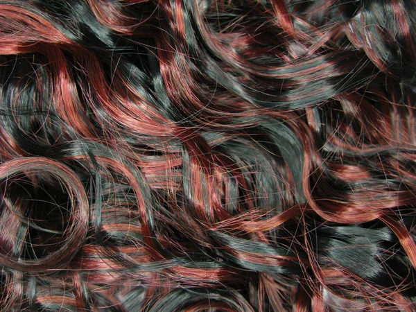 Curly mettre en évidence la texture des cheveux fond — Photo
