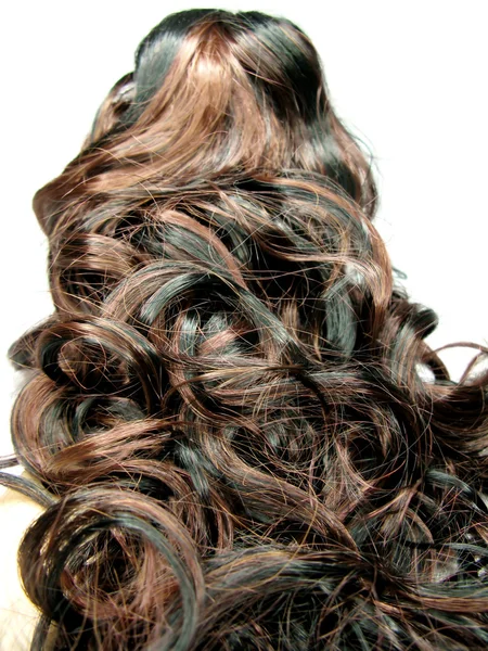 Curly korostaa hiusten rakenne tausta — kuvapankkivalokuva