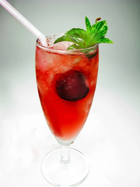 Cold cocktail drink with cherry — Stock Photo, Image