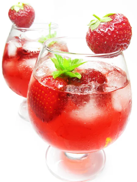 Fruit punch cocktail drink with strawberry — Stock Photo, Image