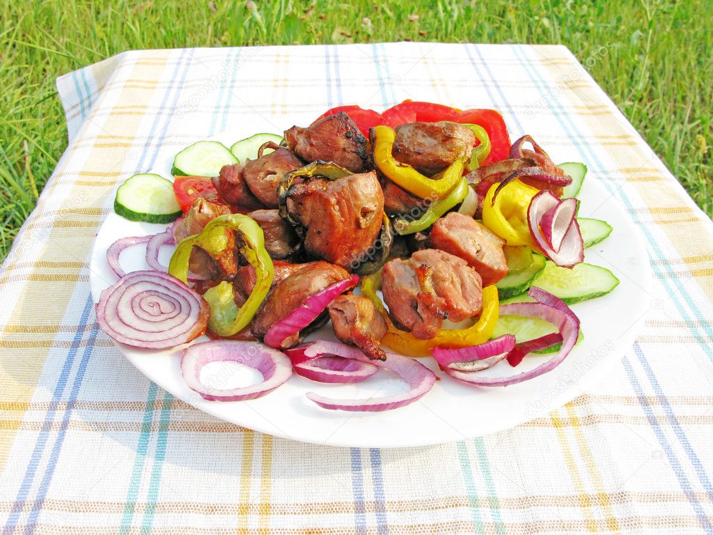 Cooked griiled meat with vegetables