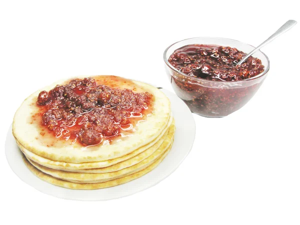 Heap of pancakes with raspberry jam — Stock Photo, Image