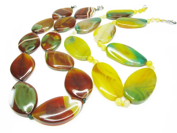 Red and yellow agate beads with white lines — Stock Photo, Image