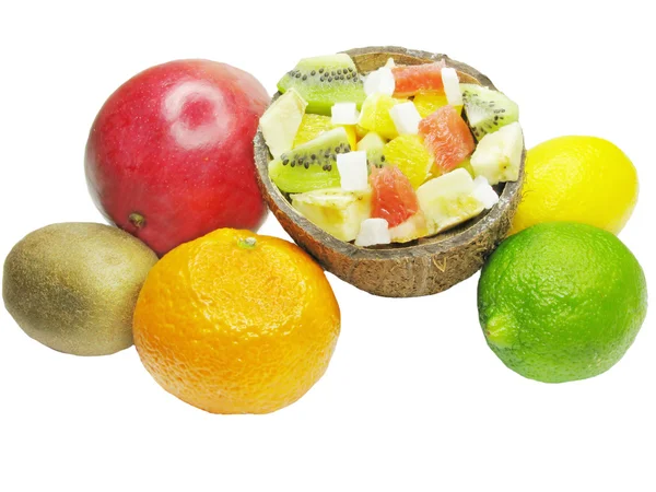 Tropical fruit salad in coconut — Stock Photo, Image
