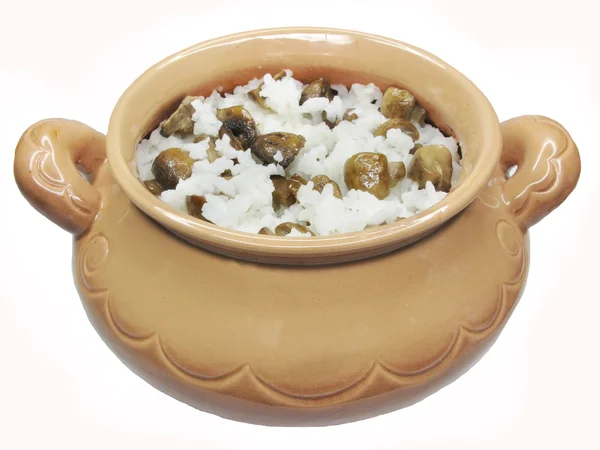 stock image Porridge in clay pot with mushrooms