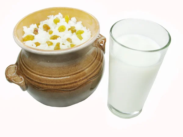 Porridge in clay pot with milk — Stock Photo, Image