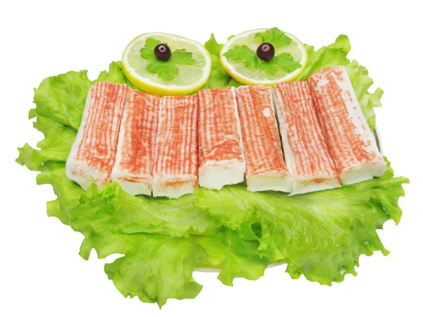 Fisk produkt på sallad grönsaker — Stockfoto