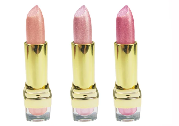 Drie roze lippenstift — Stockfoto