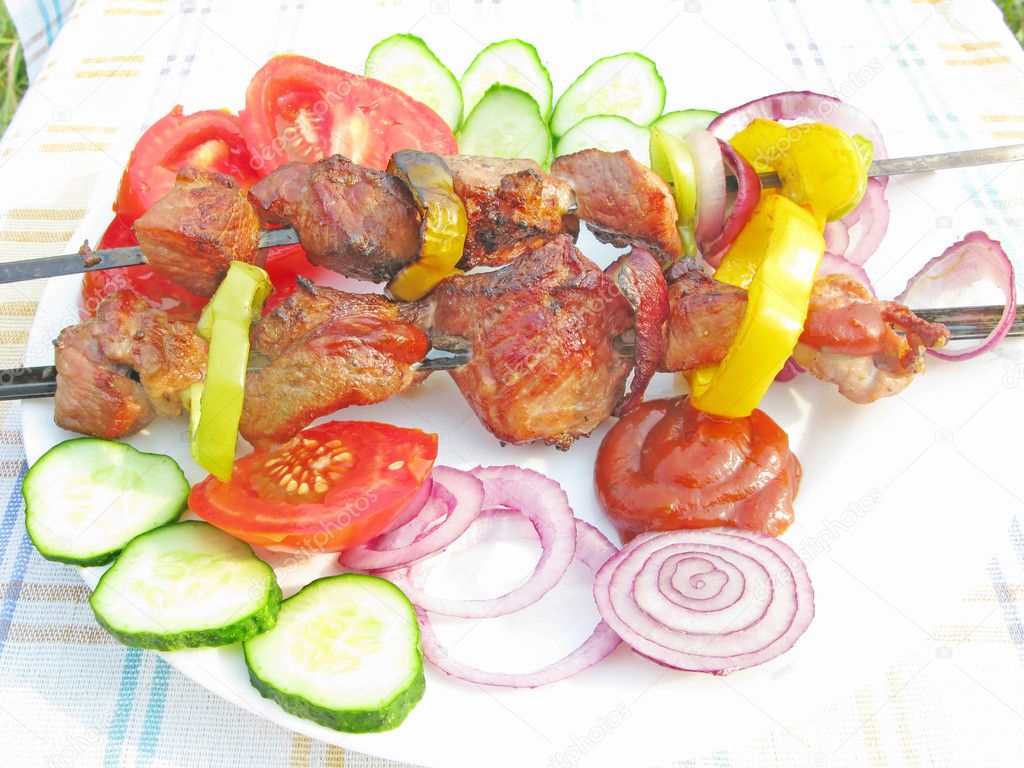 Griiled meat with vegetables barbecue outdoors