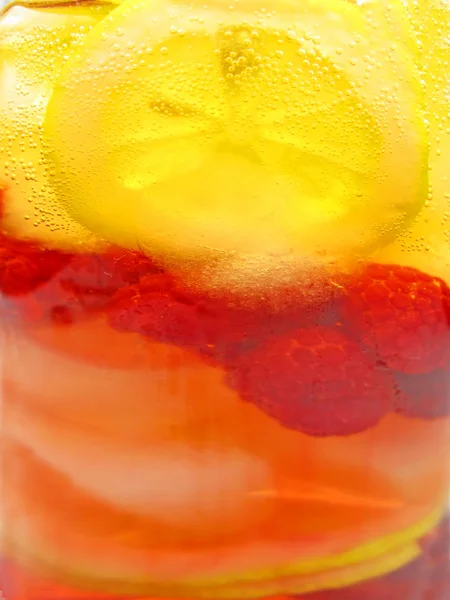Ποτό κρύο χυμό φρούτων με λεμόνι υφή φόντου — Φωτογραφία Αρχείου