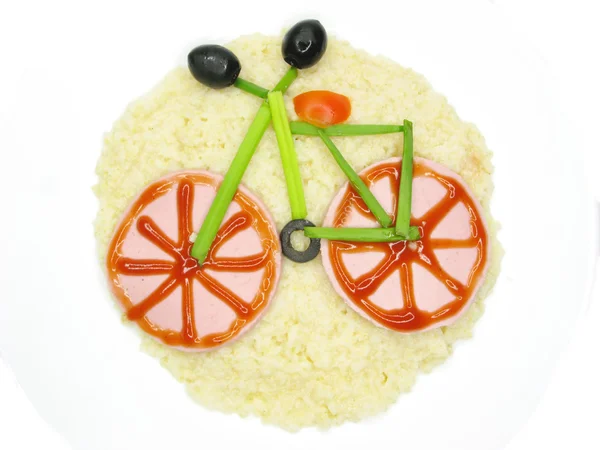 Creative porridge bicycle shape — Stock Photo, Image