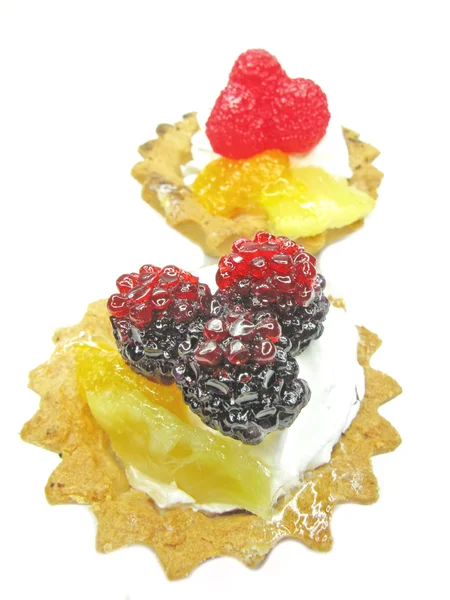Sweet fancycakes with fruits — Stock Photo, Image