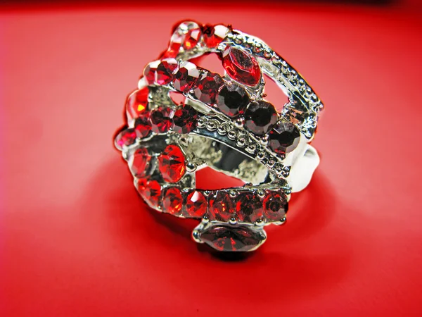 Jewelry ring with red ruby crystals — Stock Photo, Image