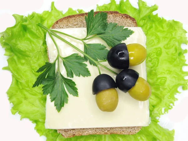 Creative vegetable sandwich with olives — Stock Photo, Image