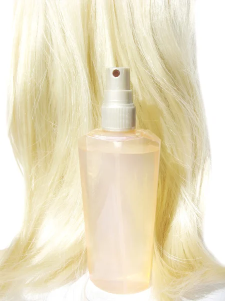 Shiny blond hair wave and spray — Stock Photo, Image
