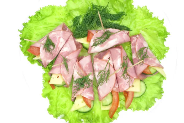 Speck auf Salatgemüse — Stockfoto