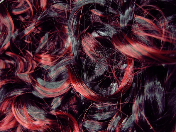 Belysa mörkt lockigt hår textur bakgrund — Stockfoto
