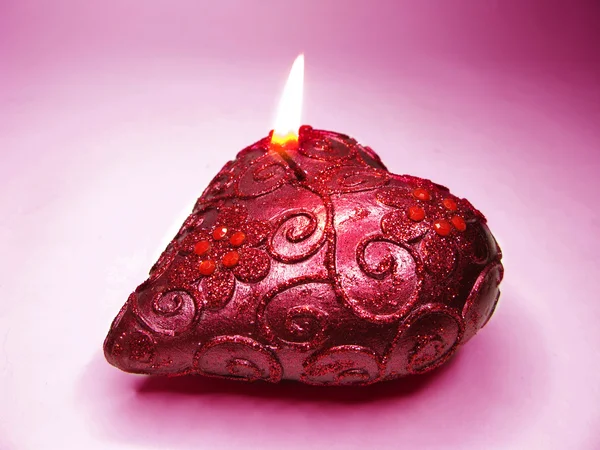 Roze geparfumeerde spa aroma kaars hart vorm — Stockfoto