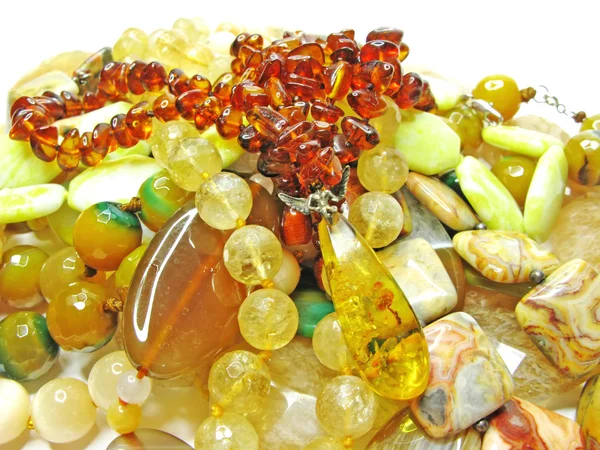 Heap of yellow semigem beads — Stock Photo, Image