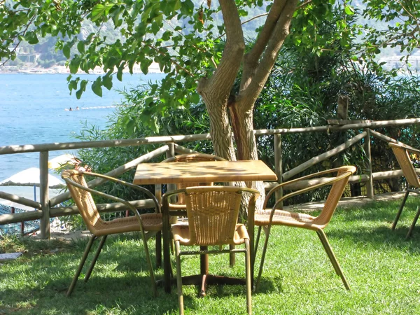 stock image Cafe near sea comfortable tables and chairs