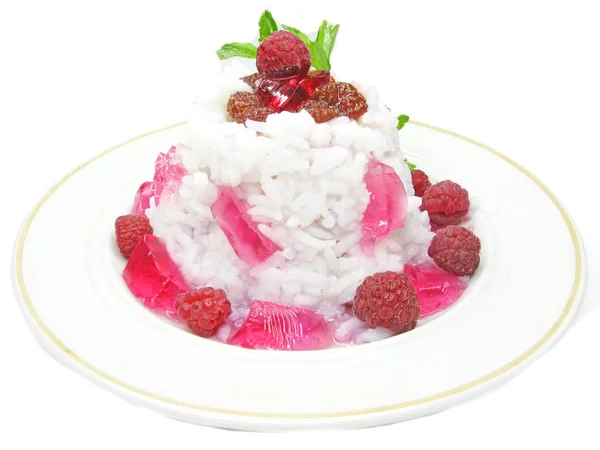 Rice porridge with raspberry jam — Stock Photo, Image